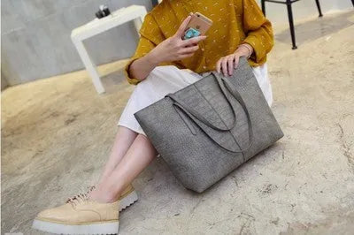 New simple fashion shoulder handbag in black and grey for spring summer.