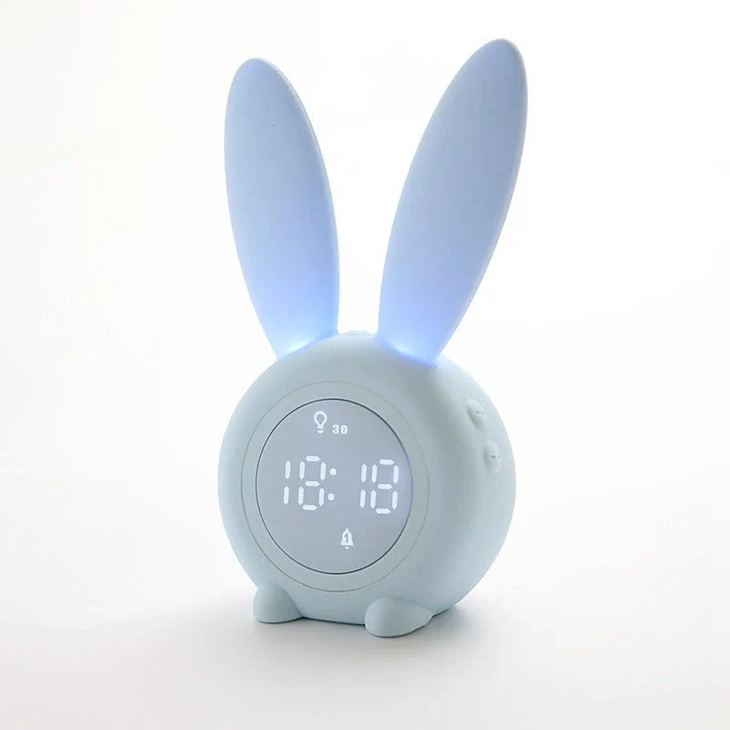 Adorable bunny-eared LED alarm clock with sound control, available in blue, green, and pink colors