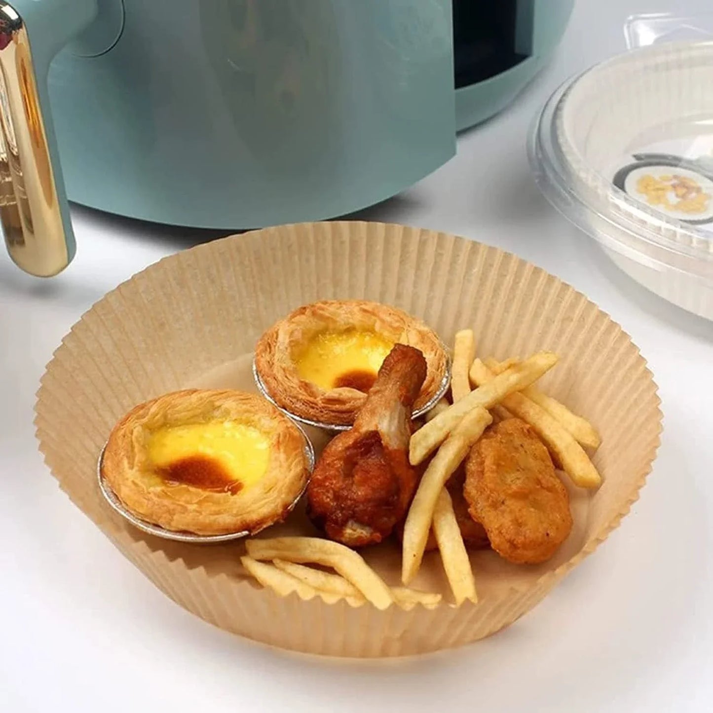 Disposable air fryer liners made of durable, food-grade parchment paper for effortless cleanup and healthy cooking