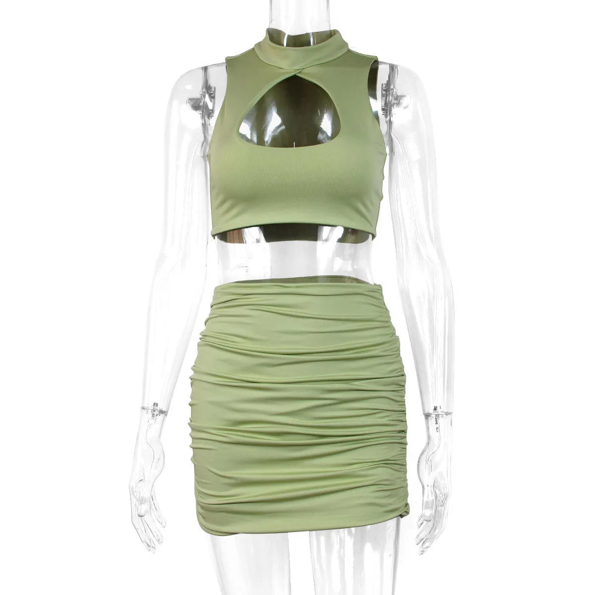 Light purple women's two-piece set featuring a hollow vest with cutouts and a high-waisted split skirt on a model.