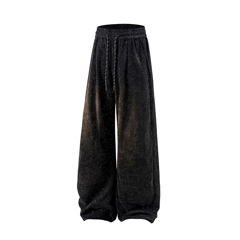 Light grey fleece-lined straight-leg trousers with hollow-out detail and elastic waistband on a hanger.