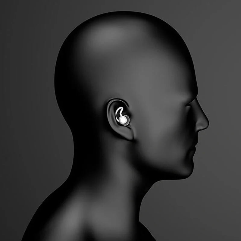 Silicone anti-noise sleep earplugs in grey and black, featuring shark fin design for secure fit