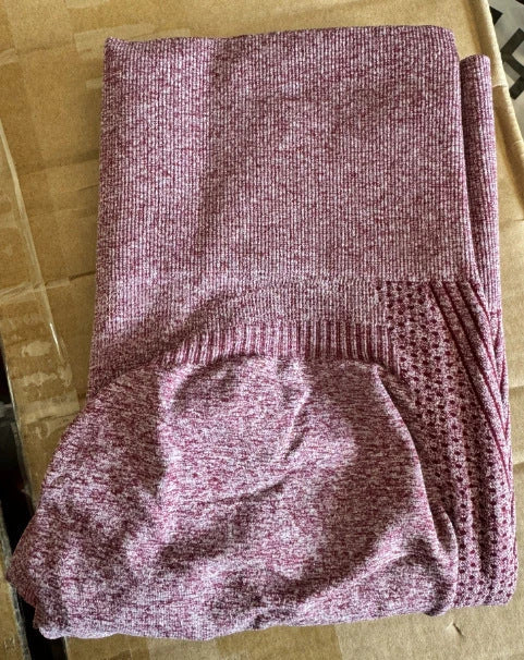 Women's high-waist seamless leggings in a variety of vibrant colors, featuring a curve-flattering design and breathable nylon fabric