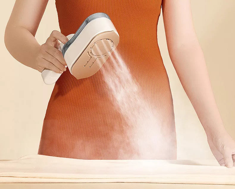 Gray handheld garment steamer with 1200W power and 3-step thermostat