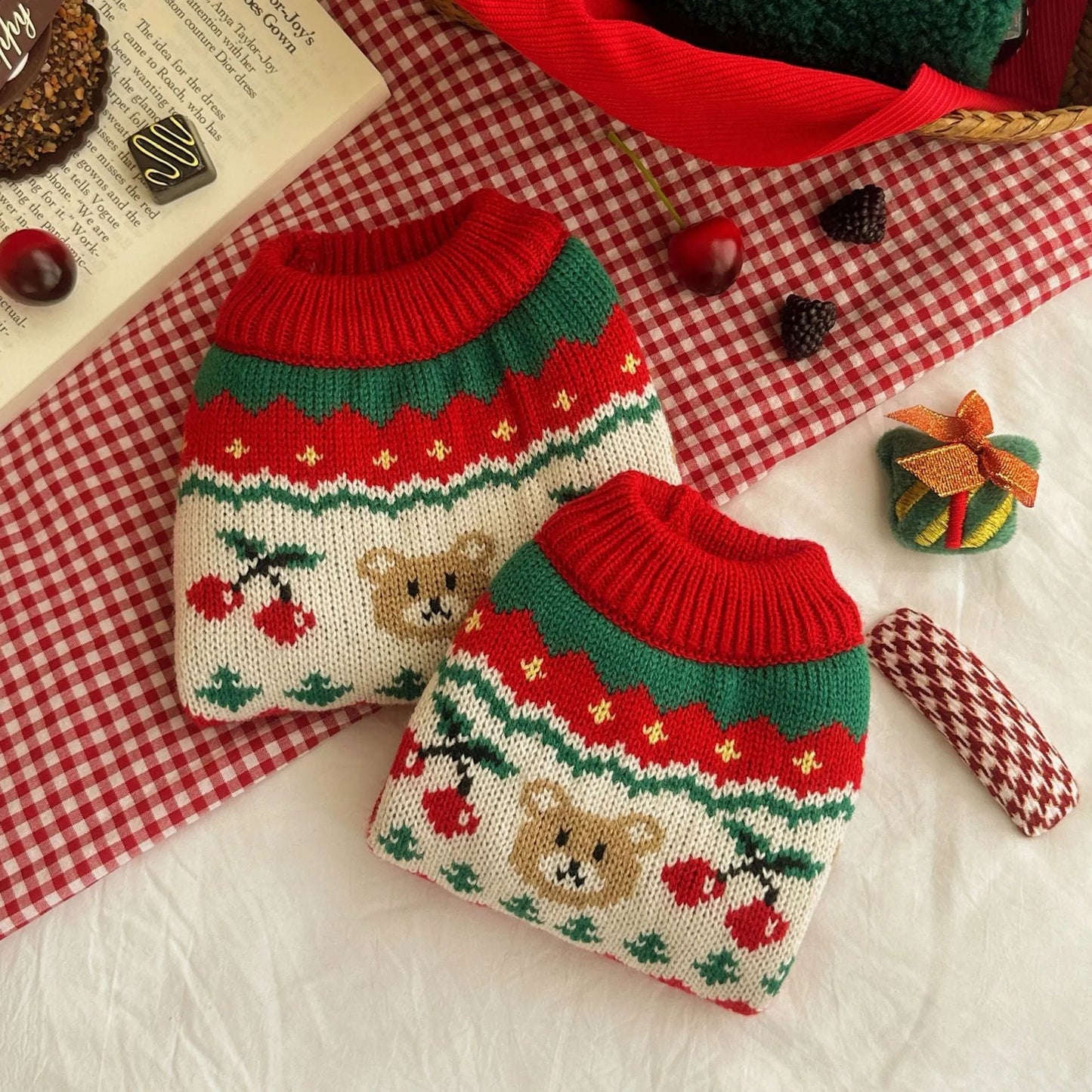 Red Christmas cherry pattern pet sweater for small to medium dogs and cats on mannequin
