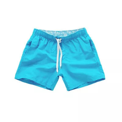 Men's summer surf shorts in various colors, made from 100% polyester for quick drying and durability