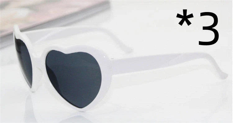 Stylish heart-shaped lighting sunglasses with a plastic frame and resin lenses, creating a mesmerizing effect for romantic occasions