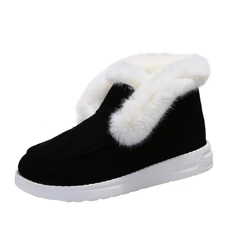 Premium warm winter snow boots for women featuring a stylish suede upper, plush lining, and durable sole for cold weather protection.