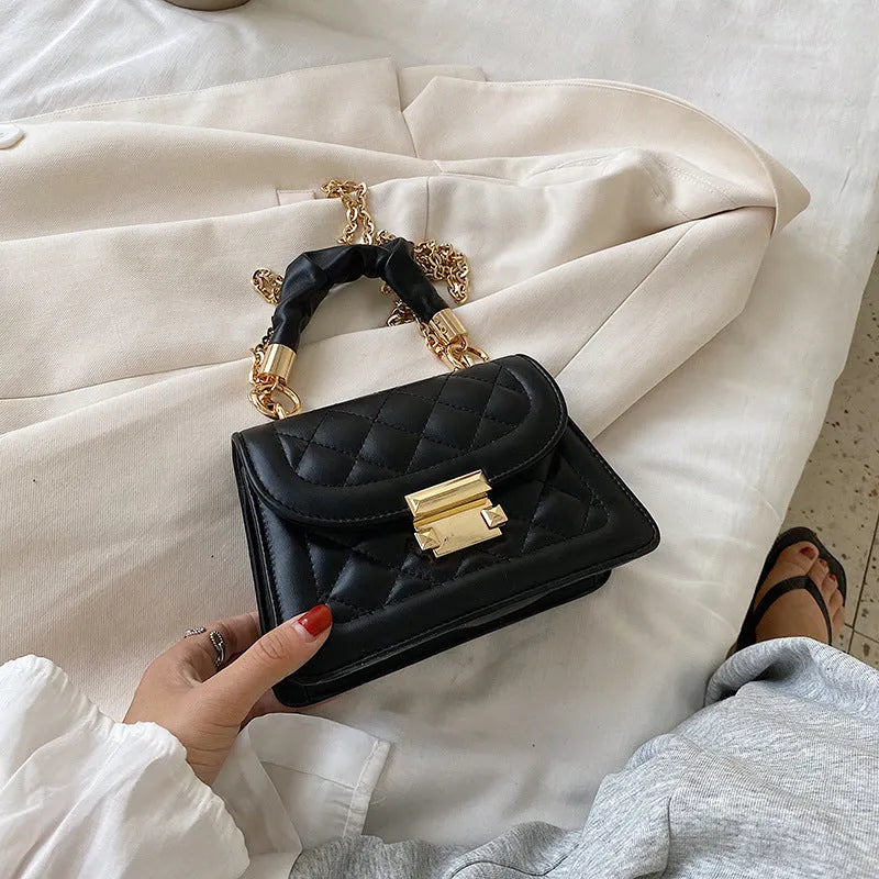 Beige rhombus-shaped women's crossbody bag with a long strap, showing front view and size.