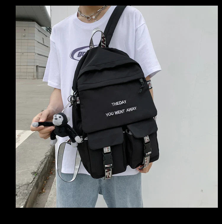 A stylish white backpack with clean lines and a modern design, perfect for college students