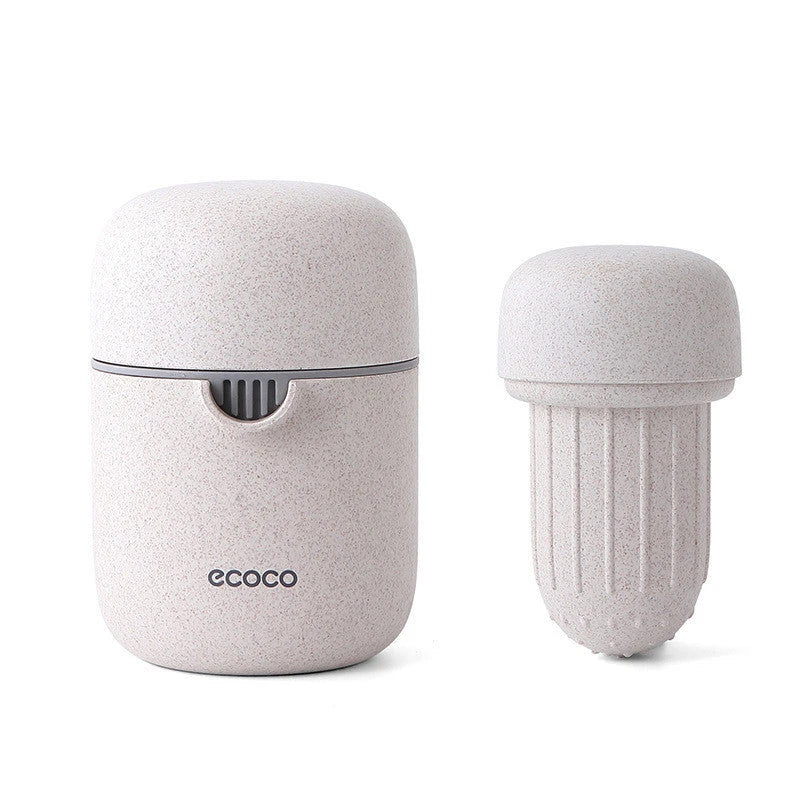 Versatile manual citrus juicer for extracting nutritious juices from oranges, lemons, grapefruits, and more using a compact and durable design