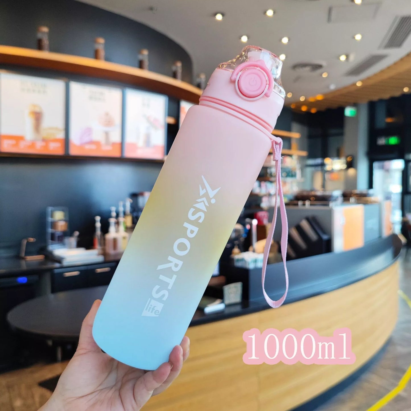 Rainbow Gradient Plastic Cup with 1L capacity in green, blue, gray, and pink colors