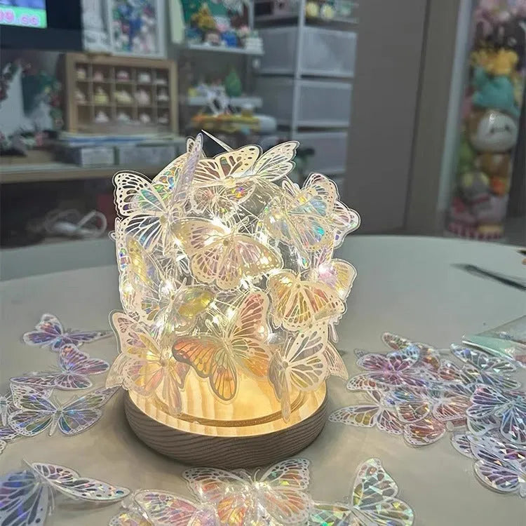 Handmade butterfly night lamp with glass shade on raw wood base, 12cm by 15cm.