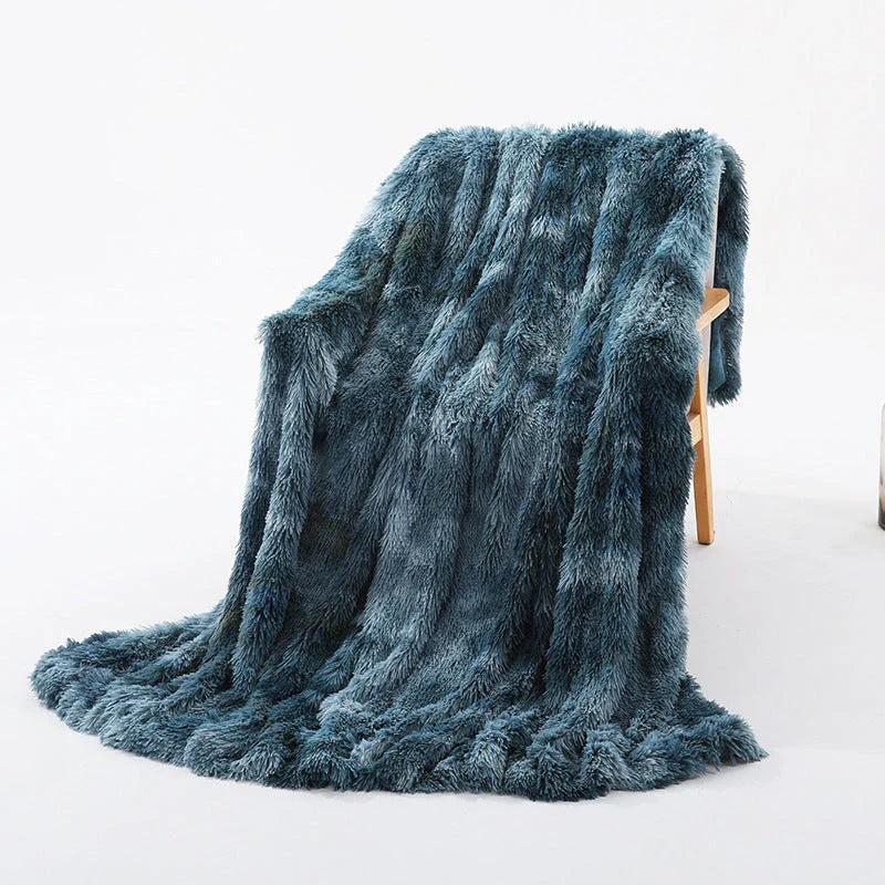 Soft, plush sherpa throw blanket in a variety of colors and sizes, perfect for cozy relaxation on the sofa or bed
