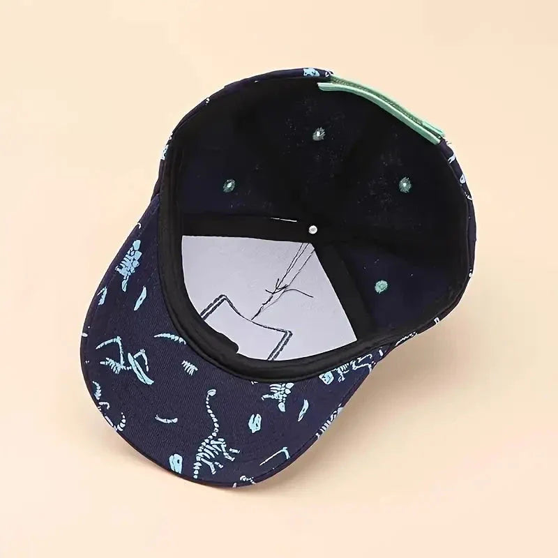 Adjustable kids' baseball cap with vibrant dinosaur prints, designed for comfort and sun protection during outdoor activities.