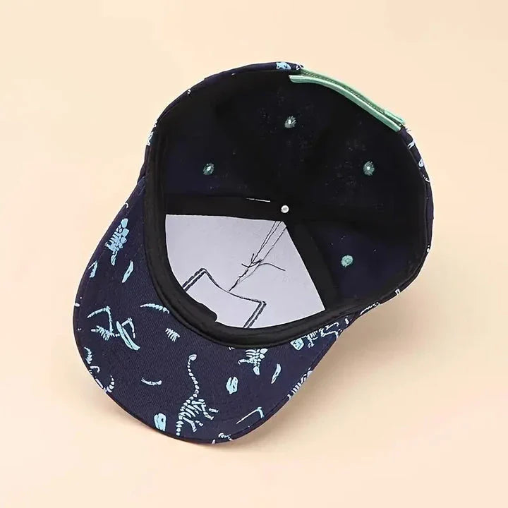 Adjustable kids' baseball cap with vibrant dinosaur prints, designed for comfort and sun protection during outdoor activities.