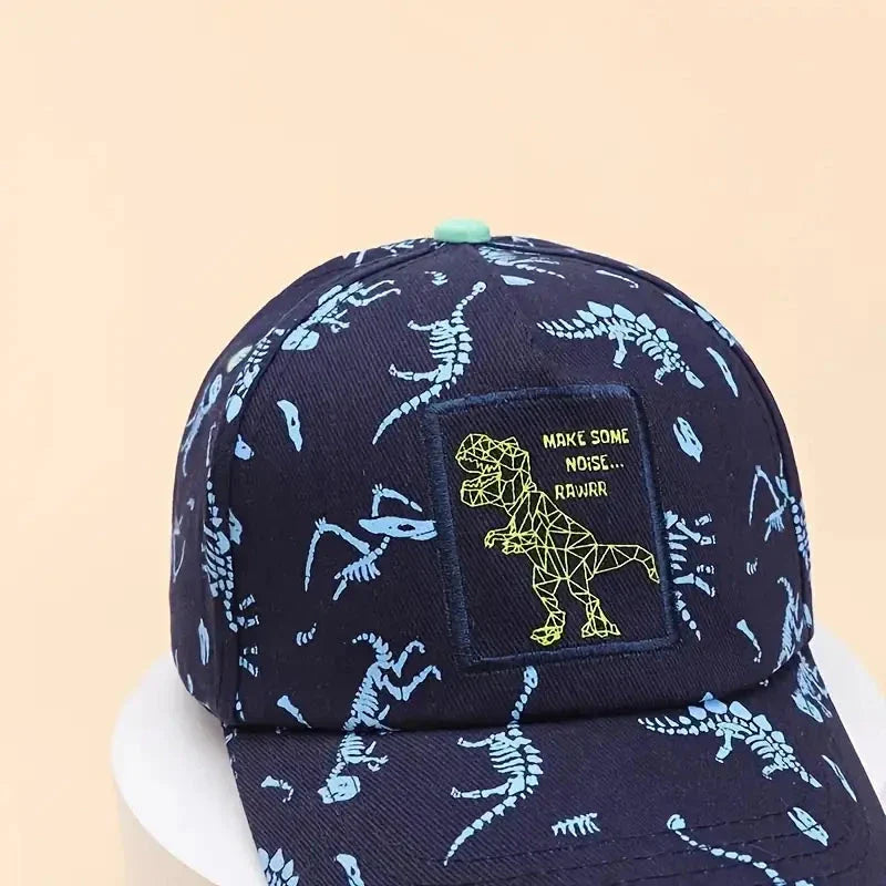 Adjustable kids' baseball cap with vibrant dinosaur prints, designed for comfort and sun protection during outdoor activities.