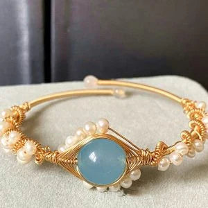 Elegant 14K gold-wrapped bracelet with natural white pearls and Hailan Baohai sapphires