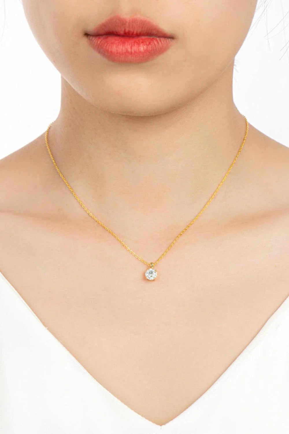 Sparkling 925 sterling silver necklace with a 1 carat moissanite center stone, showcasing a modern, minimalist chain-link design