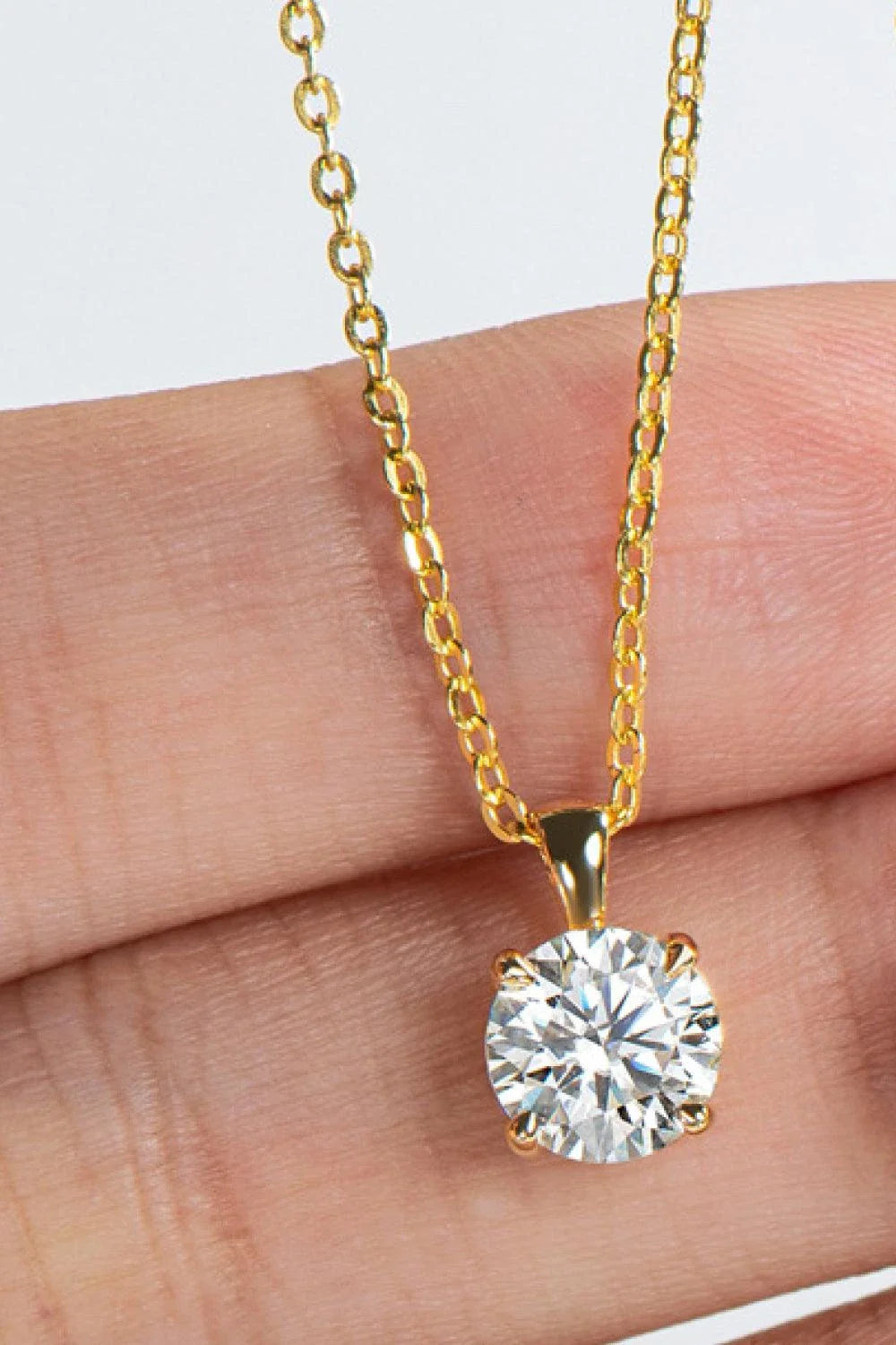 Sparkling 925 sterling silver necklace with a 1 carat moissanite center stone, showcasing a modern, minimalist chain-link design