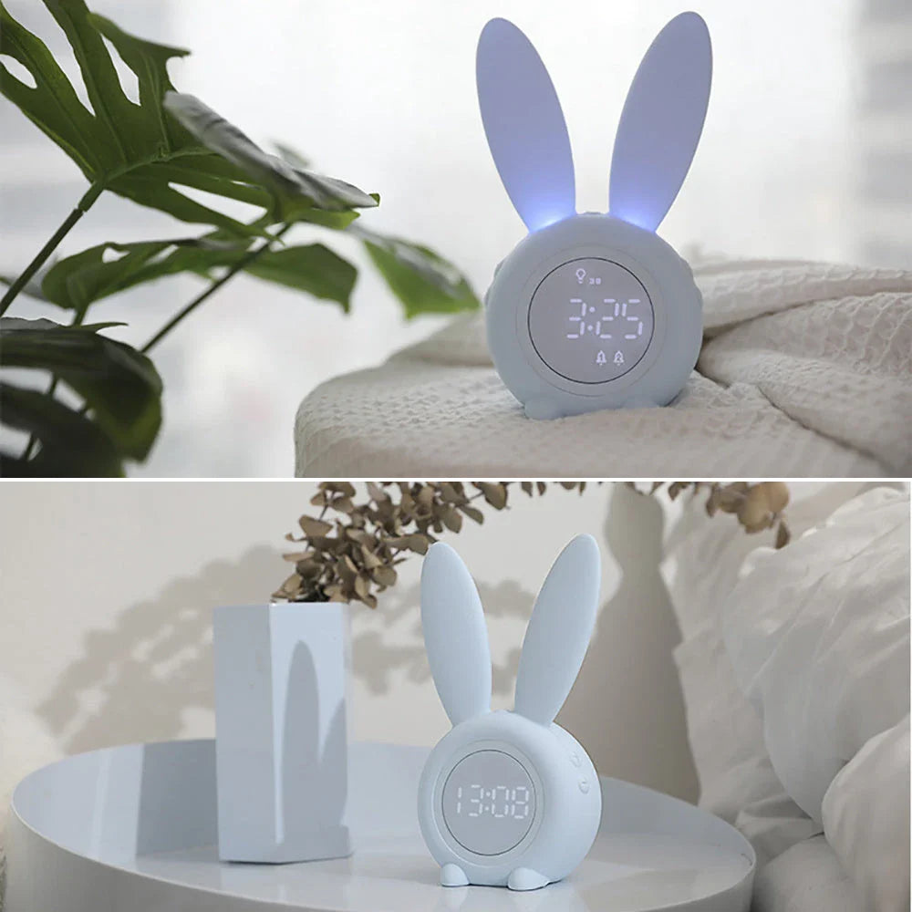 Adorable bunny-eared LED alarm clock with sound control, available in blue, green, and pink colors