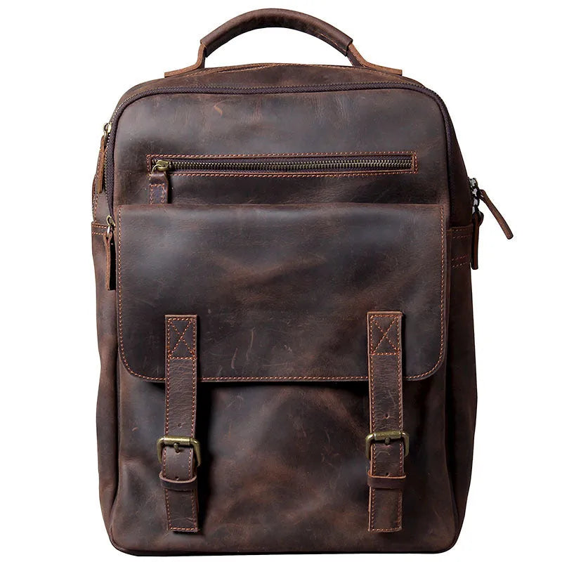 Dark coffee coloured retro leather backpack made from first layer cowhide with organised interior pockets.