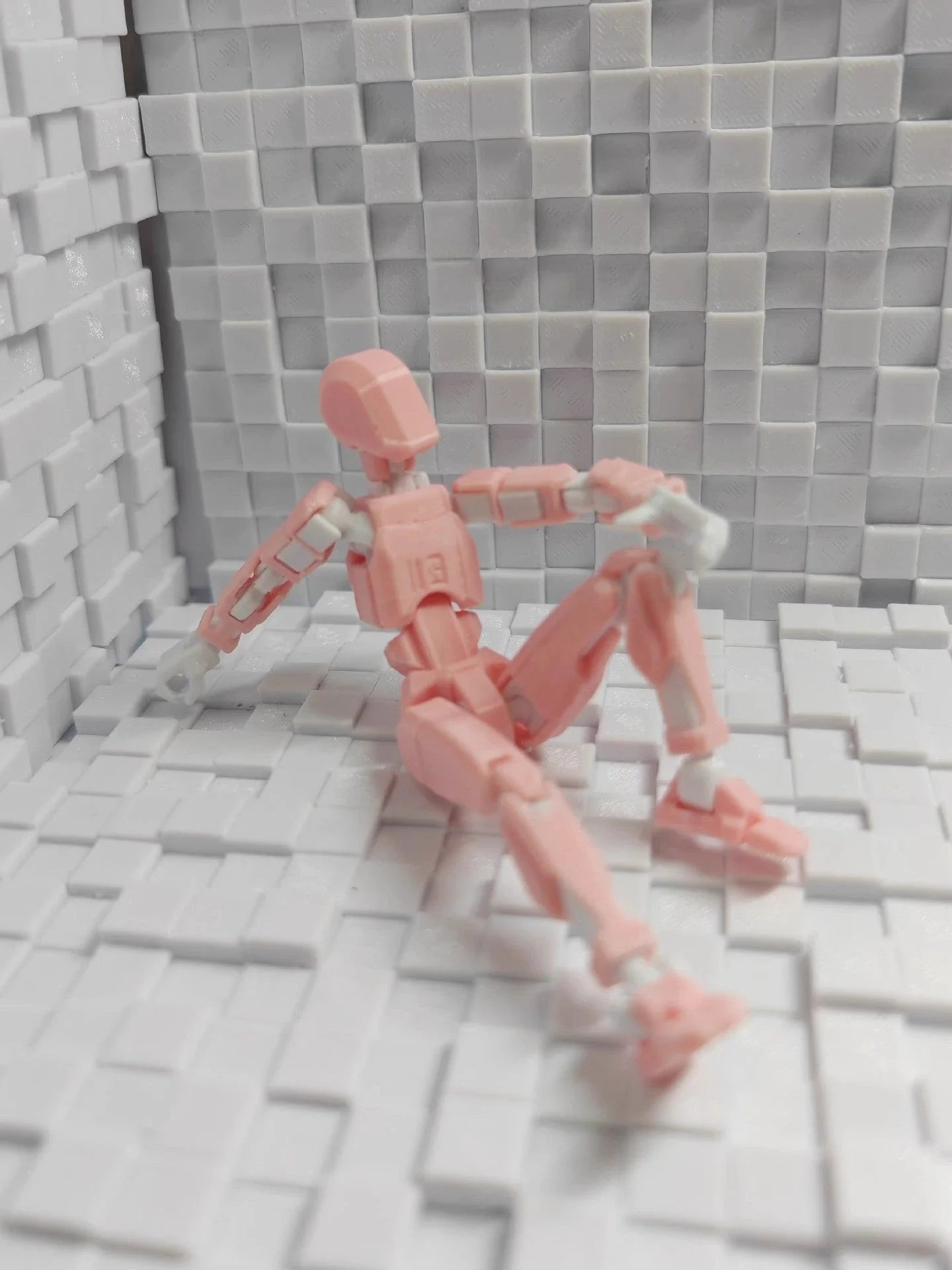 Versatile multi-jointed robotic action figure with customizable posing and design capabilities