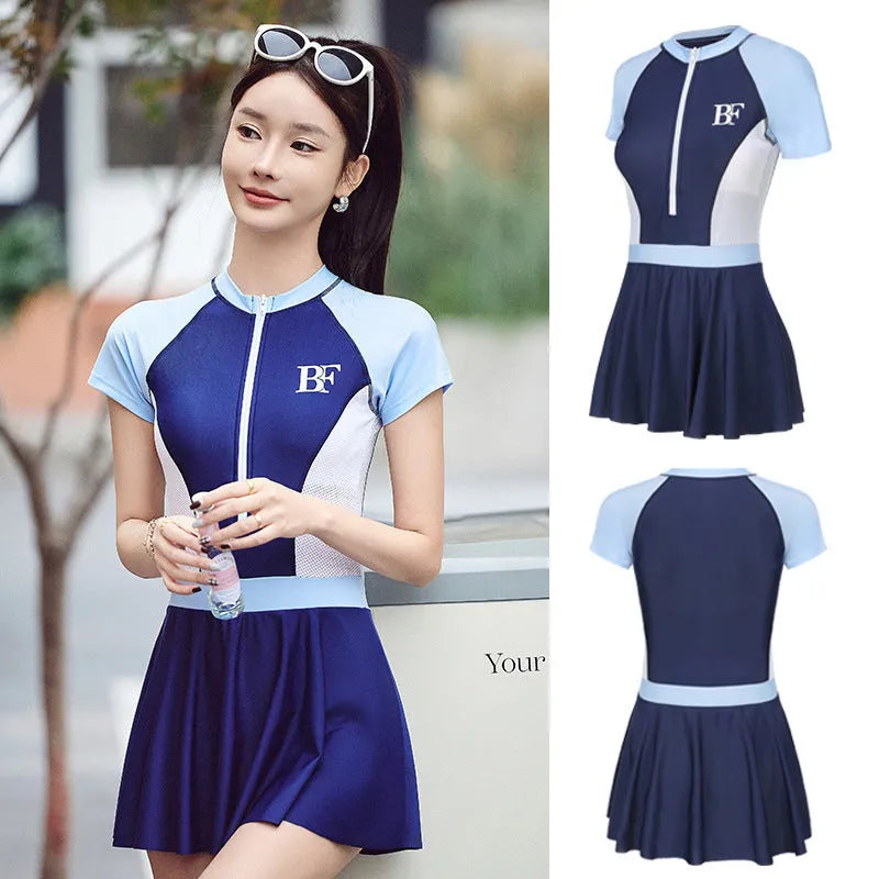 Women's conservative one-piece sports swimsuit in a tight fit, shown in colour E92 or E93.