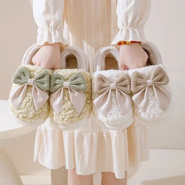 Big Bow-Knot Fluffy Slippers in various colors with a plush, cloud-like interior and non-slip soles for comfortable, stylish wear