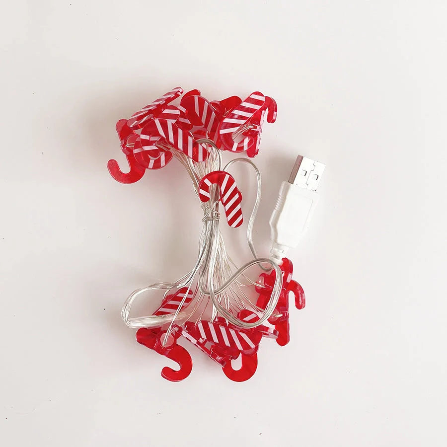 Customizable Christmas LED string lights in various designs including gift, bell, and Christmas tree shapes