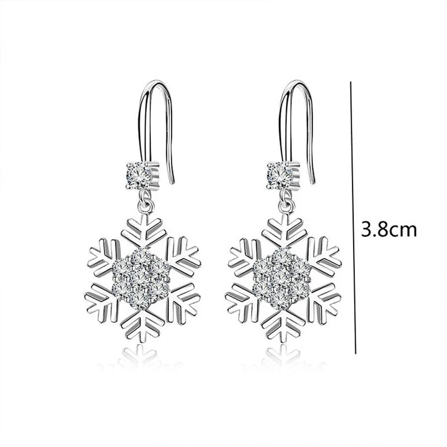 Elegant snowflake earrings with rhinestones, a personalized Christmas jewelry accessory for fashionable women