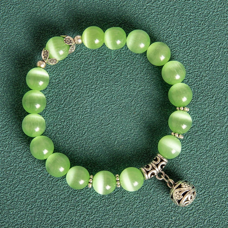 10MM Hollow Ball Korean Style Crystal Opal Beaded Bracelet in black, purple, white, pink, and green