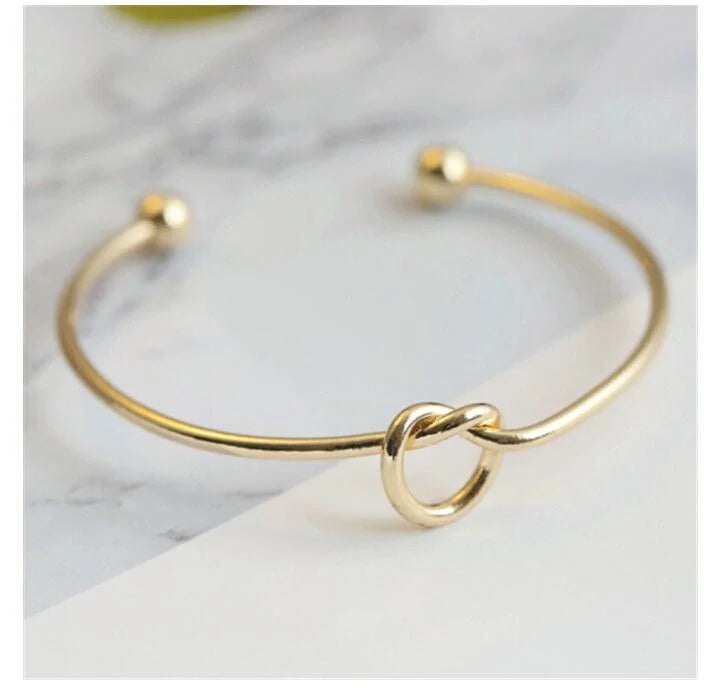 Elegant Knot O-Type Metal Openwork Bracelet with unique design for stylish women