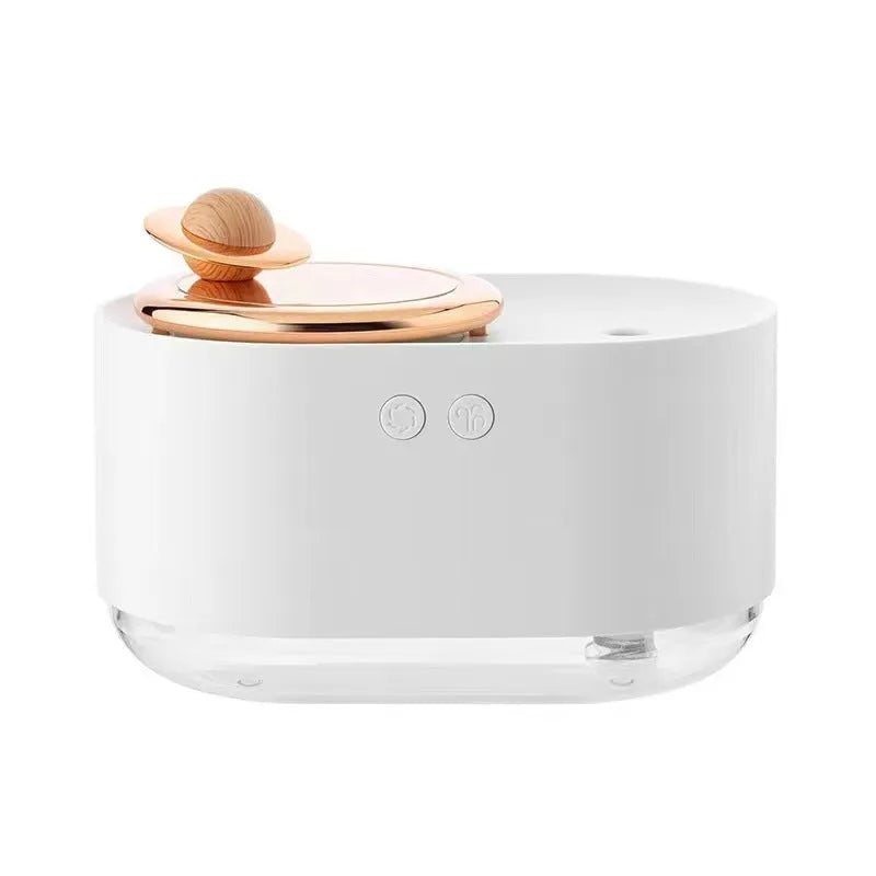 Rotating planet-shaped humidifier in green colour with USB cable and mist emitting from the top.