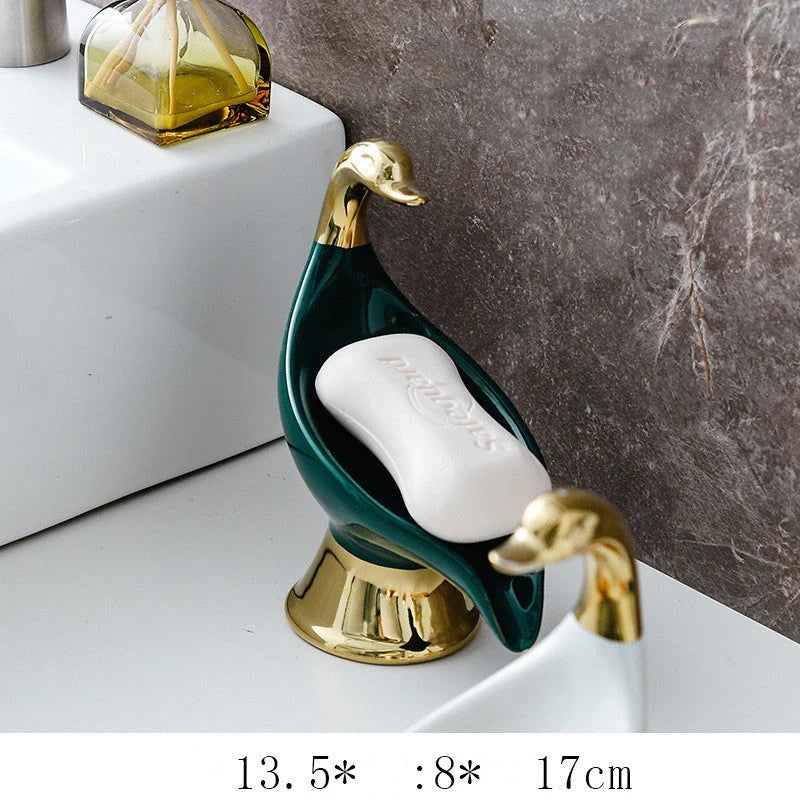 Ceramic swan soap rack in white and green with drainage cover