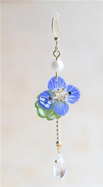 Elegant ear clips with floral and plant-inspired designs, made with premium copper and gold plating