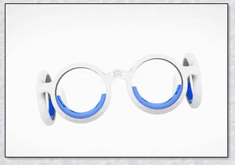 Motion Sickness Glasses with blue liquid ring that simulates the natural horizon to relieve nausea, dizziness, and vertigo.
