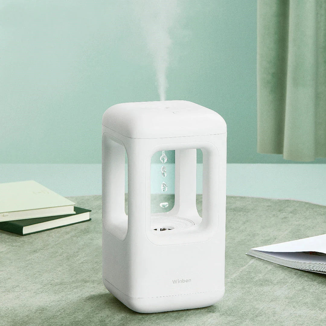 Quiet cool mist humidifier with anti-gravity water droplets, ideal for bedrooms and home decor
