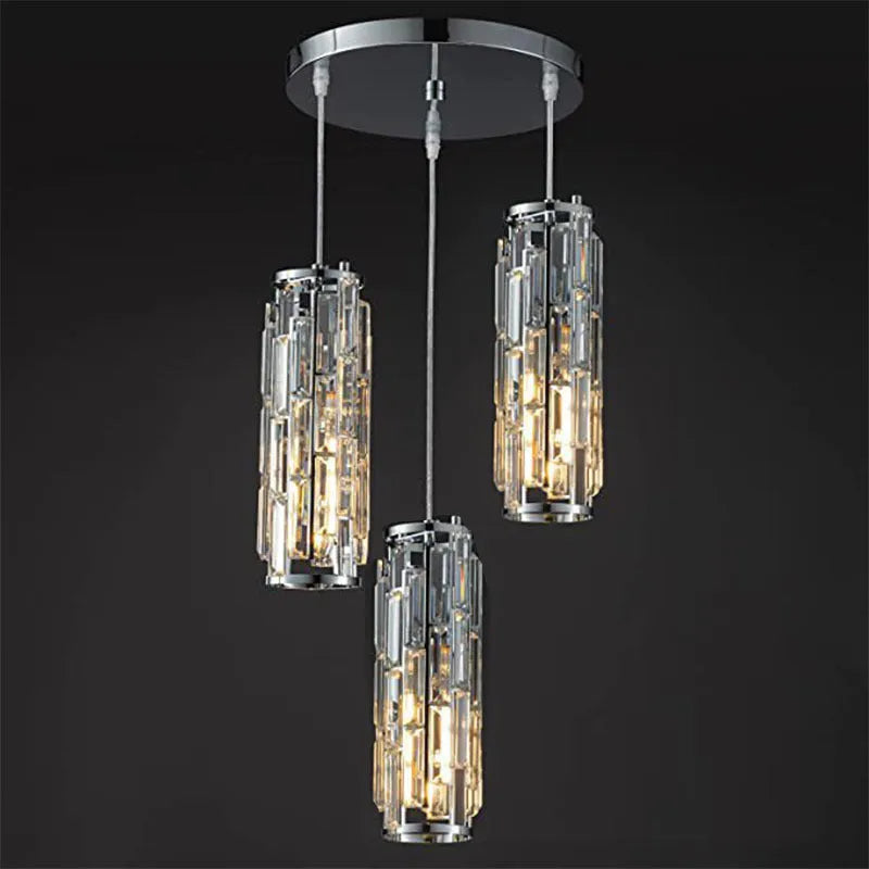 Industrial style crystal droplight with single LED head in black, gold, or chrome finish