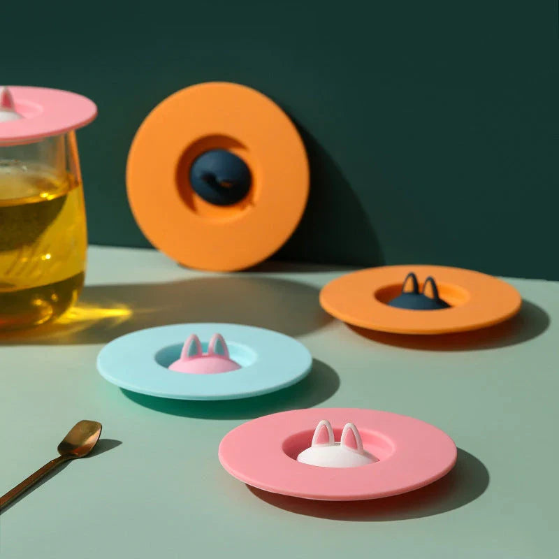 Cartoon cat ear-shaped silicone cup lid in vibrant colors, designed to be spill-proof and dustproof for your daily beverages