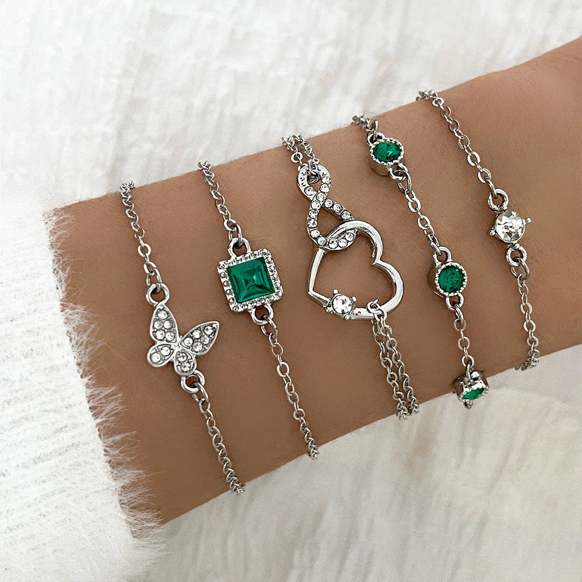 Elegant 5-piece green crystal bracelet set with unique bohemian-inspired design and premium alloy construction