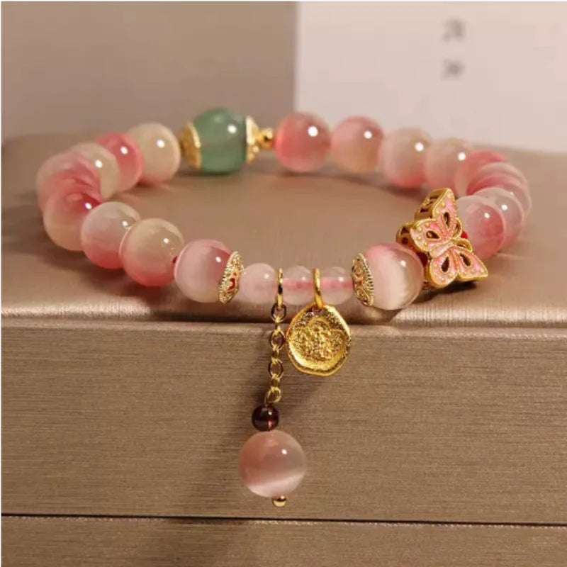 Pink opal butterfly women's bracelet with Chinese-style detailing and electroplated metal