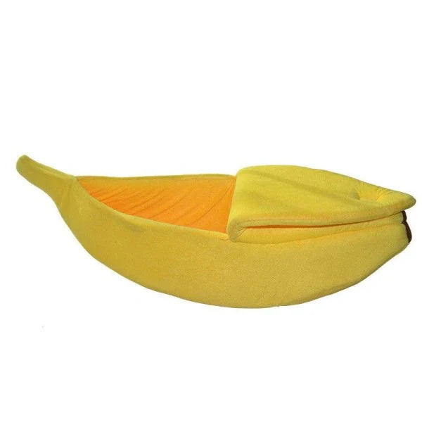 Comfortable banana-shaped pet sleeping bag made with soft, plush materials for cozy pet napping