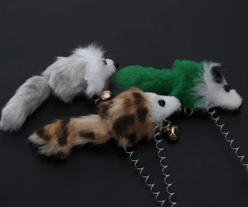 A set of plush and plastic mouse-shaped toys for cats to play with, encouraging their natural hunting instincts.