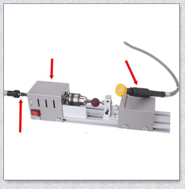 A compact, powerful mini woodworking lathe with a sleek silver design and various accessories for creating intricate wood carvings and projects.