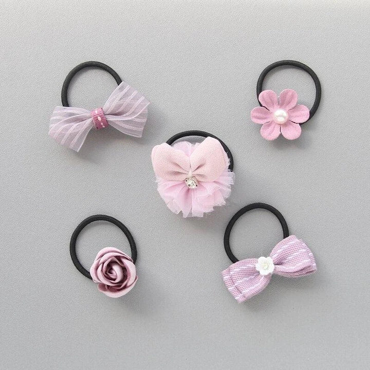 Colorful and stylish hair accessories for dogs, including bows and clips in various shades to complement your furry friend's unique personality.