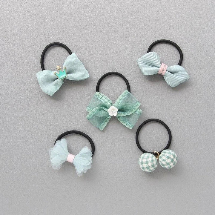 Colorful and stylish hair accessories for dogs, including bows and clips in various shades to complement your furry friend's unique personality.