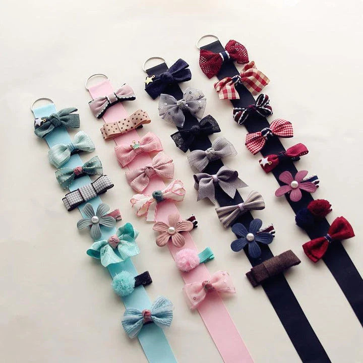 Colorful and stylish hair accessories for dogs, including bows and clips in various shades to complement your furry friend's unique personality.