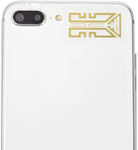 Gold-colored cell phone signal enhancement sticker booster for improved reception and reduced static
