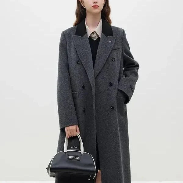 A luxurious 100% wool women's long grey coat with a timeless double-breasted design and stylish notched collar